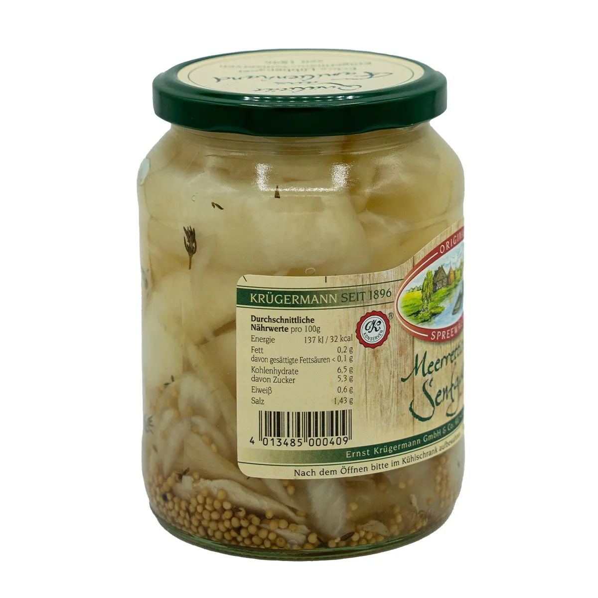 Glas mit Gurken von der linken Seite